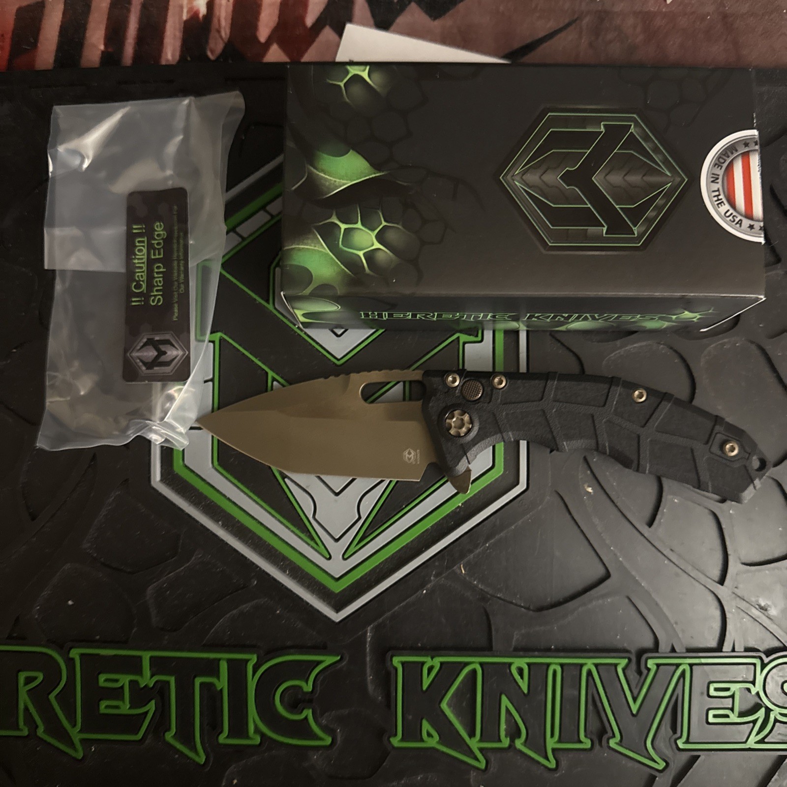 Heretic Knives Martyr Manual – Black Polymer Bronze MagnaCut Tanto H057-7A