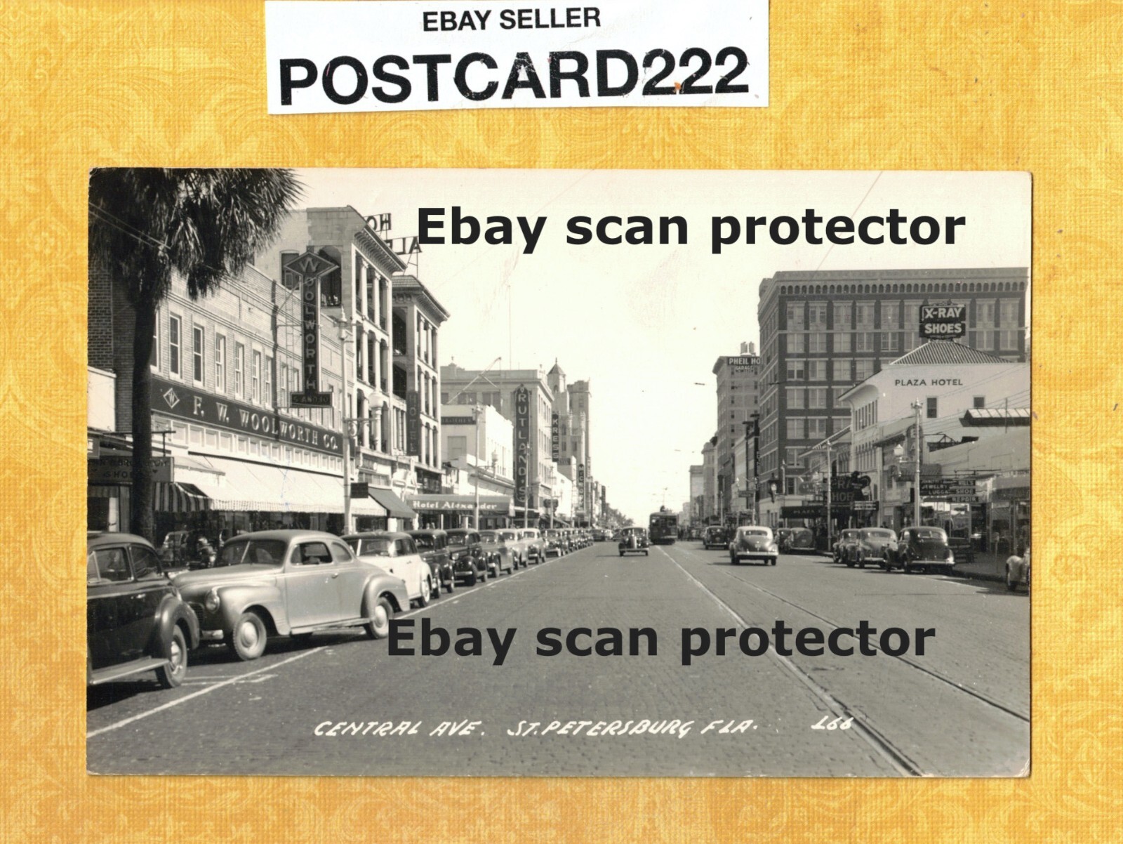 Fl St Petersburg 1940-50s era RPPC postcard CENTRAL AVE SHOPS & AUTOMOBILES