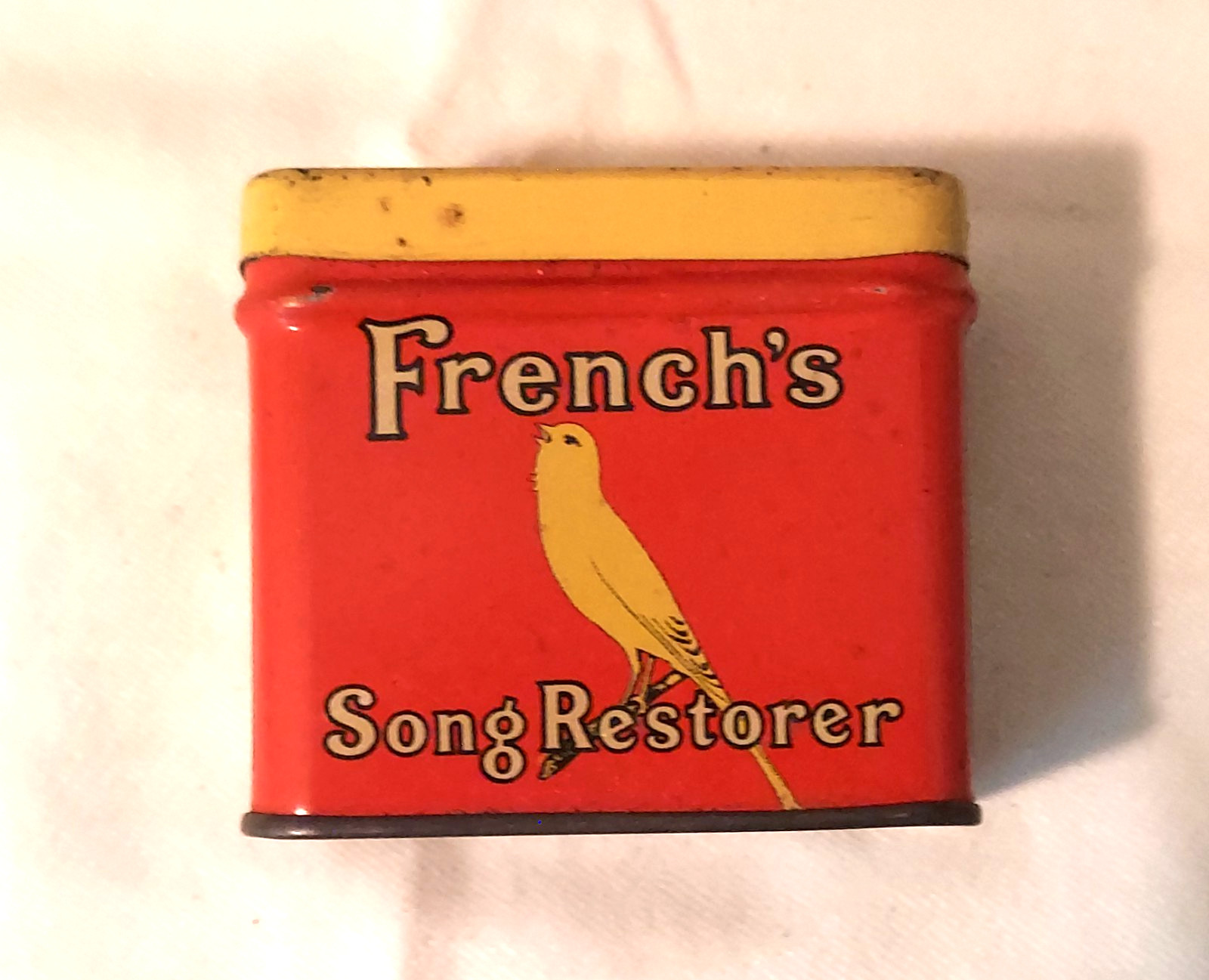 Vintage French's Song Restorer Advertising Container Empty. Vintage French's Song Restorer Advertising Container Empty.