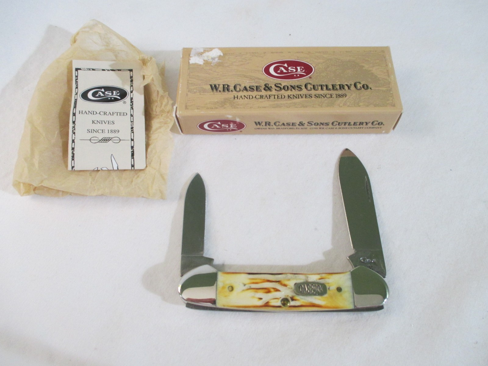Case XX 1998 Burnt White Canoe BW 62131, Item 02604
