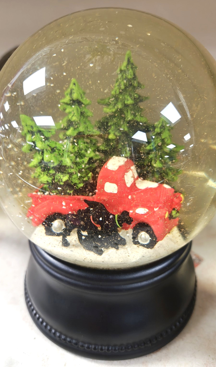 Red Truck with Dogs Snow Globe Christmas Evergreens Glass Globe Round Resin Base