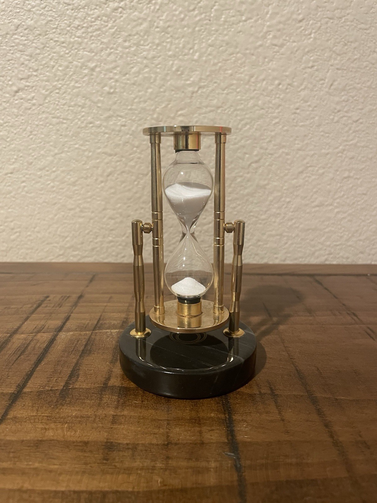 Vintage Brass Rotating Hourglass on Marble Base Vintage Brass Rotating Hourglass on Marble Base