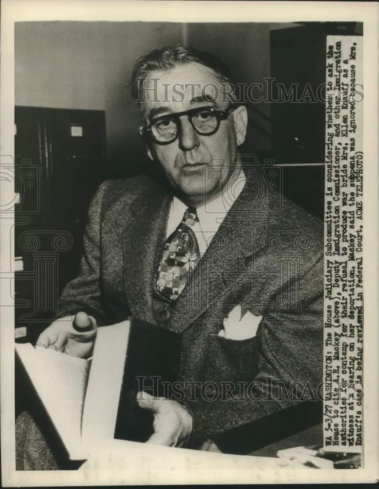 1950 Press Photo Deputy Immigration Officer A.R. Mackey - nox32198 1950 Press Photo Deputy Immigration Officer A.R. Mackey - nox32198