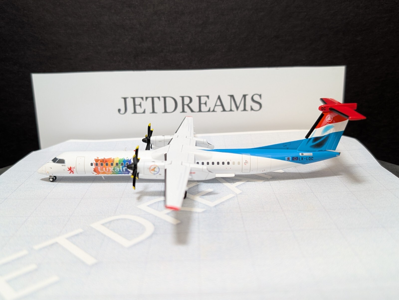 1/200 LUXAIR BOMBARDIER Q400-8 / DASH-8 BE PRIDE COLORS LX-LQC JC WINGS