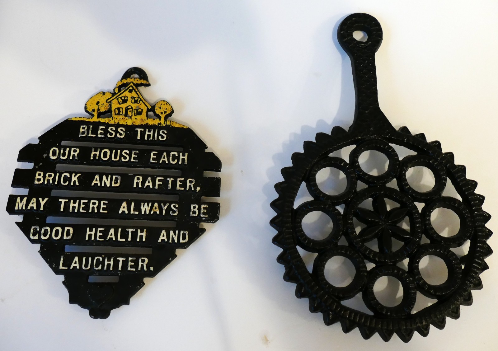 2 Vintage Cast Iron Trivets, on legs, hanging hook