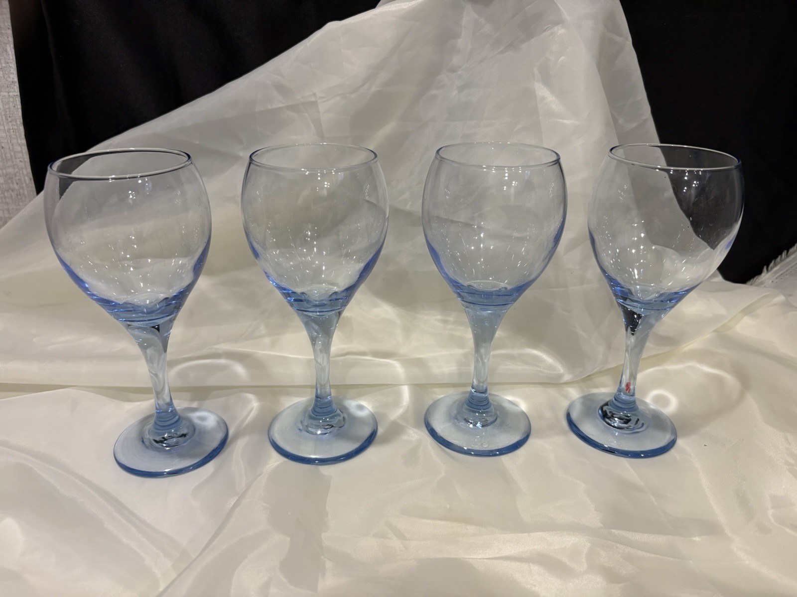 Four (4) Light Blue 7 1/8” Crystal Wine Glasses