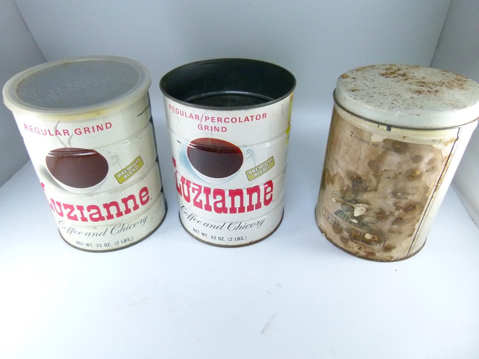 3 Vintage Luzianne two pound coffee tins 1 dated 1967, min. rust. 1 w/lid