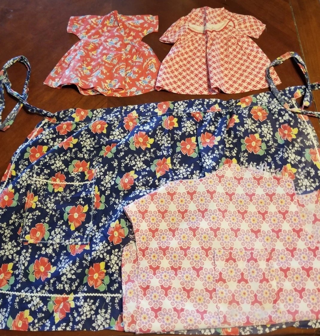Feedsack Lot, 1/2 Apron, 2 Feedsack Doll Dresses. Extra Feedsack Fabric Included
