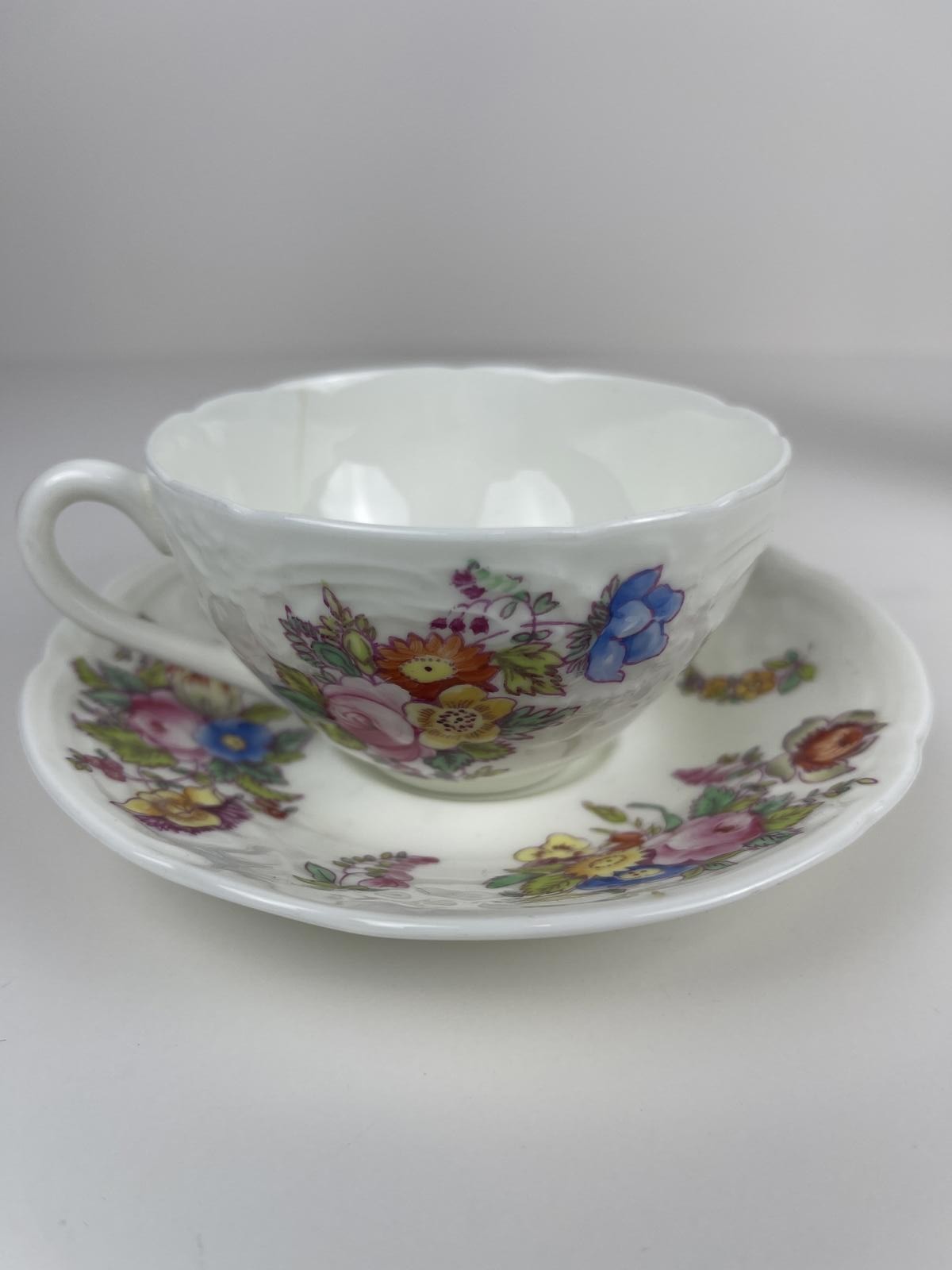 Flowered English Made Tea Cup & Saucer Coalport A.D. 1750 