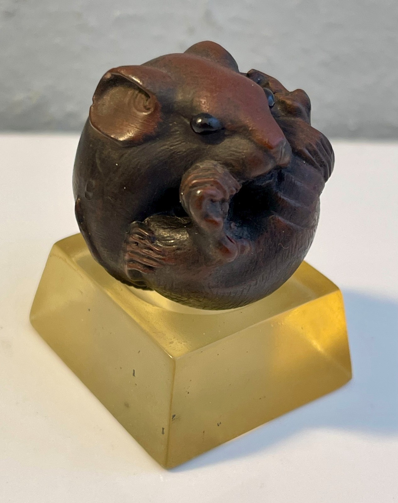 Vintage Japanese “Resin” Netsuke carved coiled rat attributed to artist Masanao