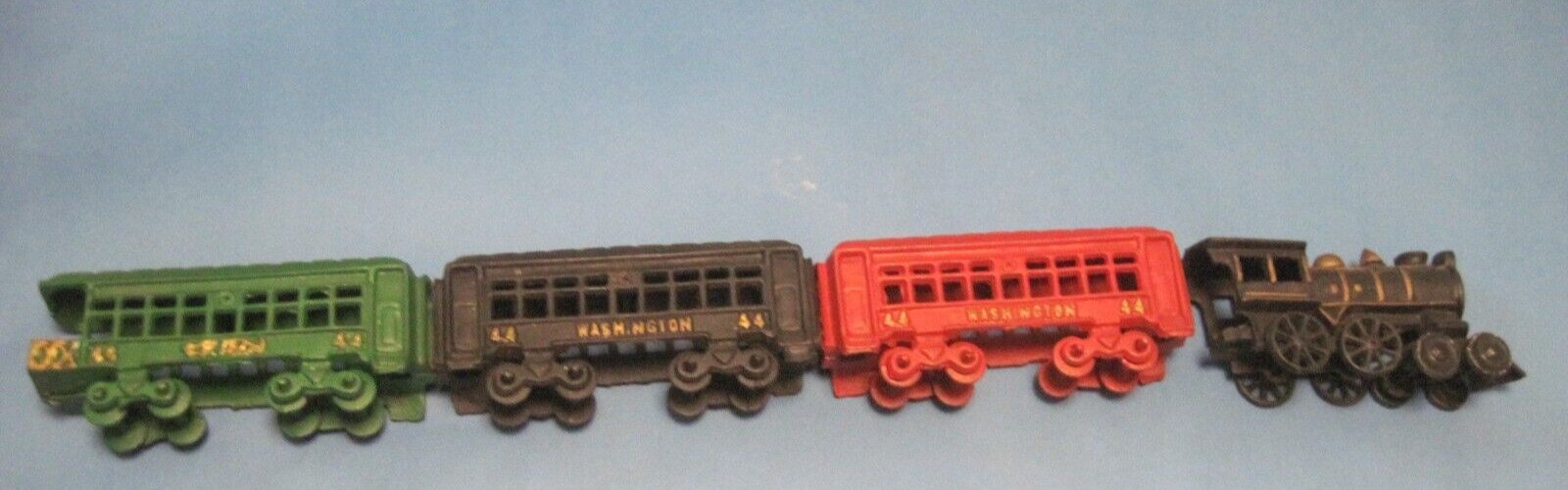 Cast Iron Train Engine and 3 cars new excellent