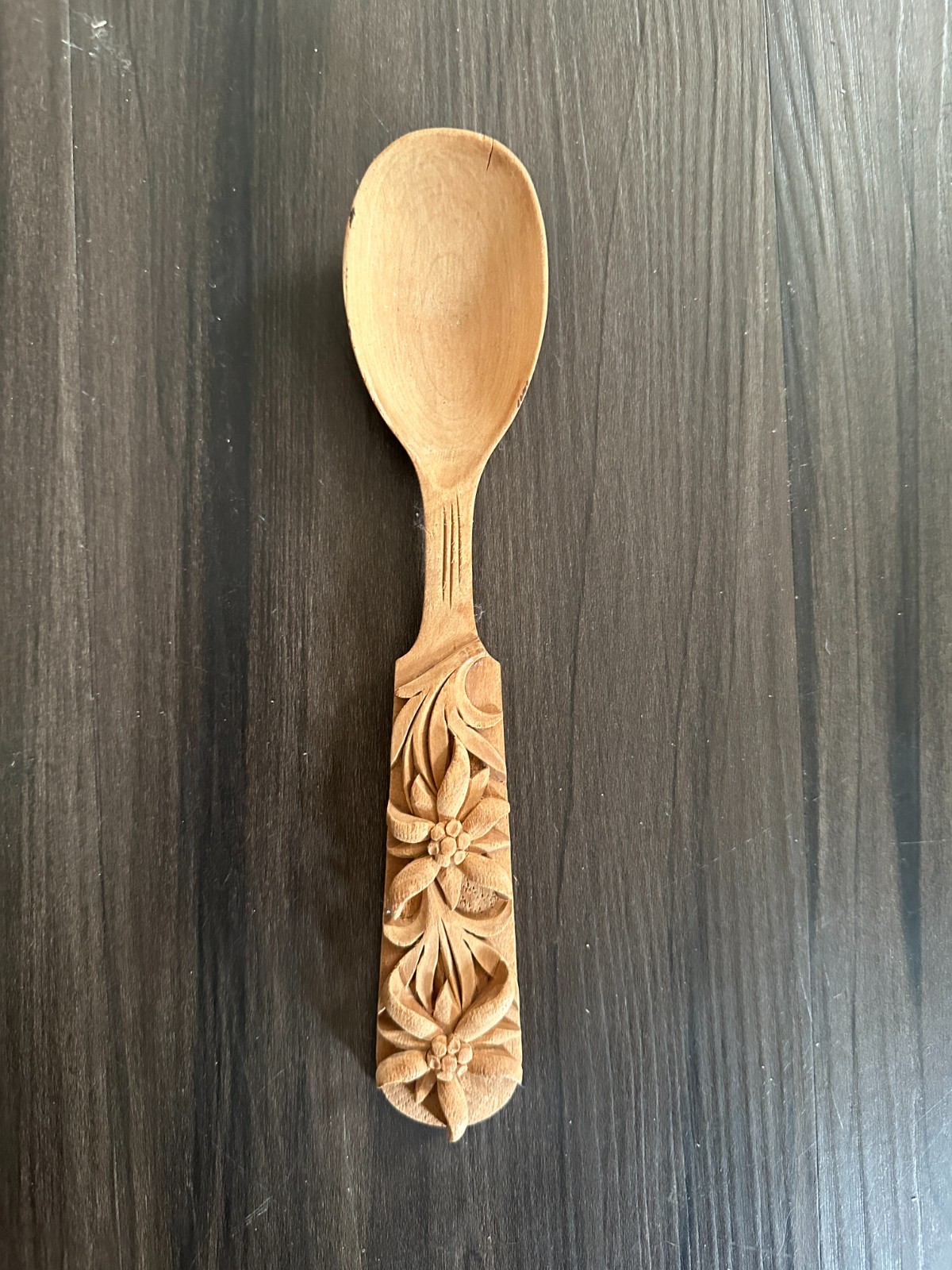 Vintage intricately hand carved wood spoon with flower floral design