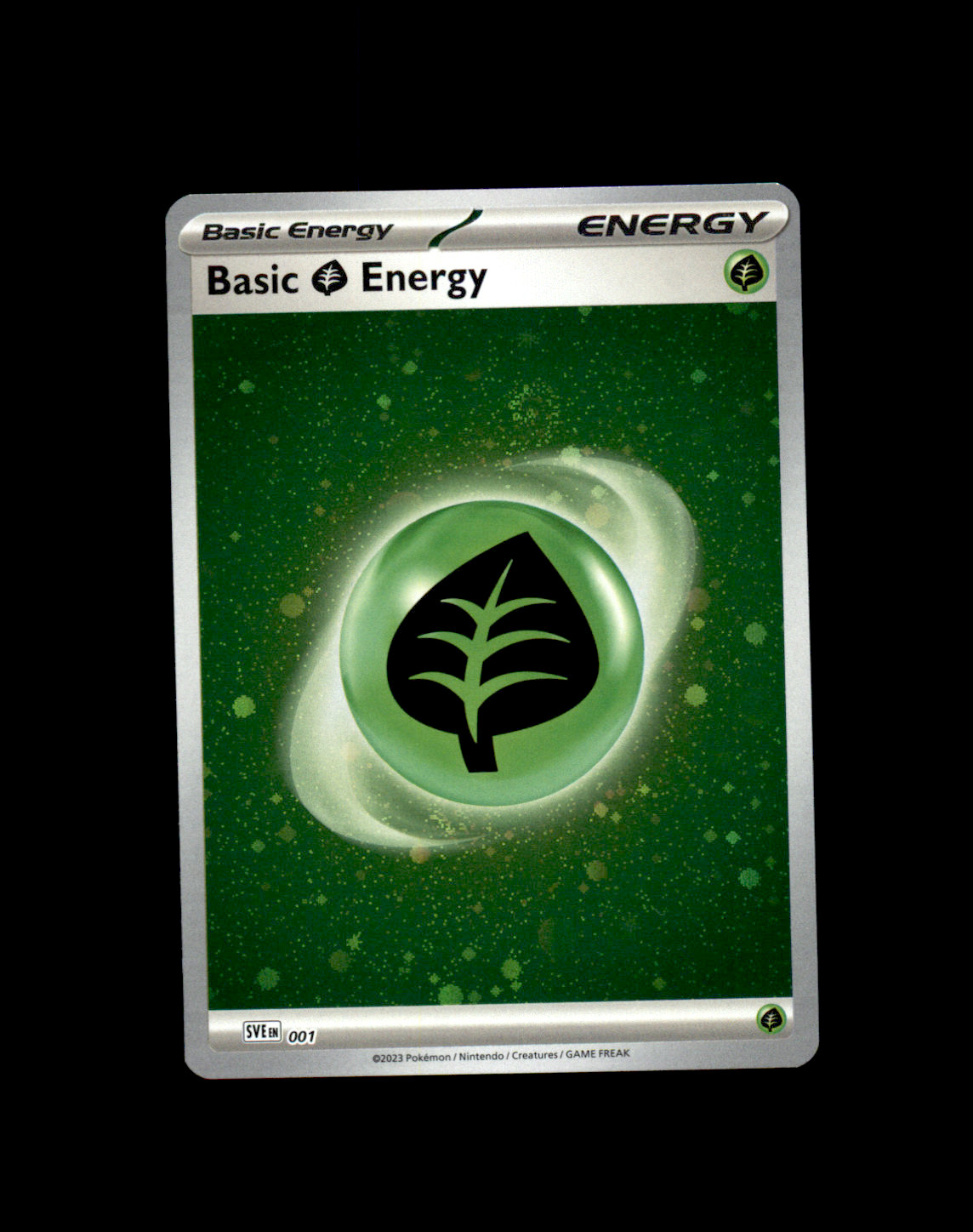 SVE Leaf / Grass Energy Cosmo Holo w/ Swirls SVE 001 NM Pokemon TCG 3 SVE Leaf / Grass Energy Cosmo Holo w/ Swirls SVE 001 NM Pokemon TCG 3