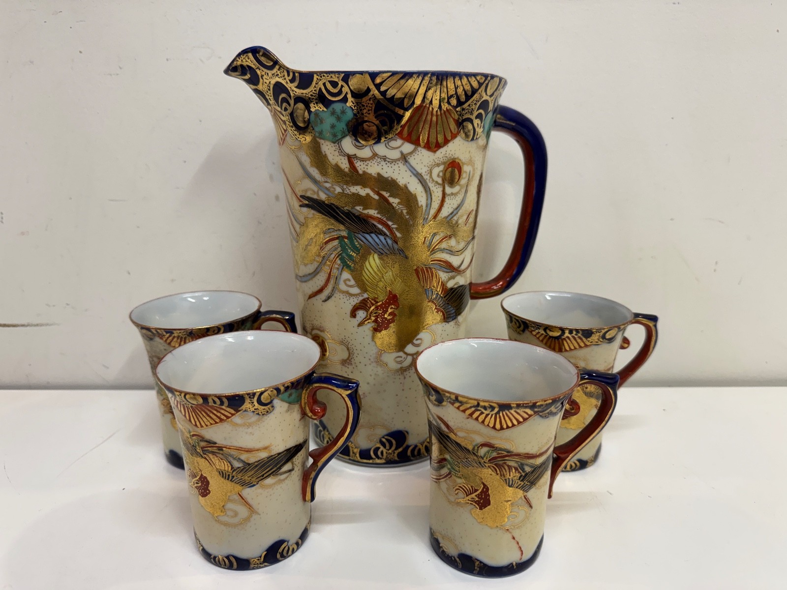 Antique Tashiro Co. Japanese Kutani Pitcher & 4 Cups with Painted Phoenix Dec. Antique Tashiro Co. Japanese Kutani Pitcher & 4 Cups with Painted Phoenix Dec.