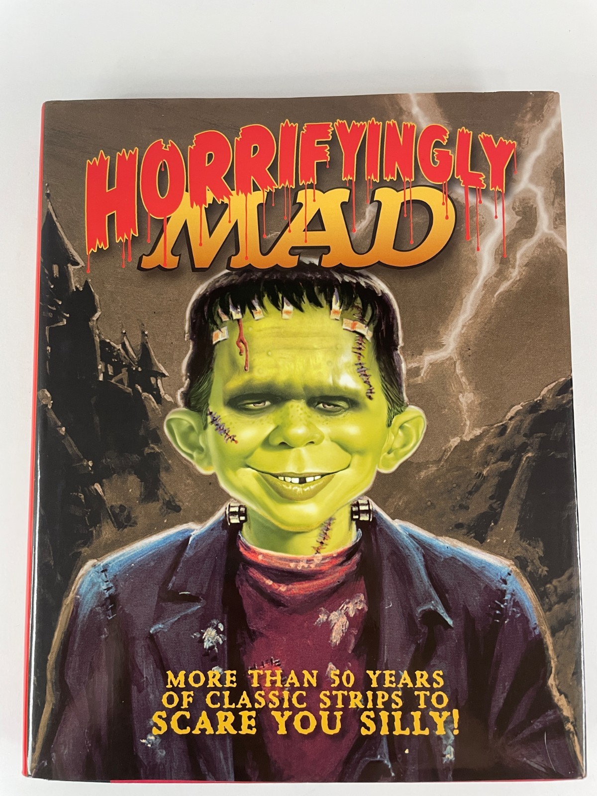 Horrifyingly Mad: More than 50 Years of Classic Strips to Scare you Silly