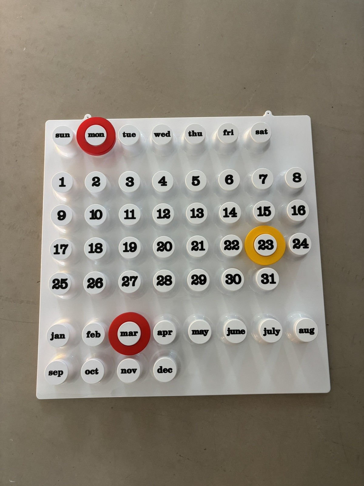Ring A day date wall calendar