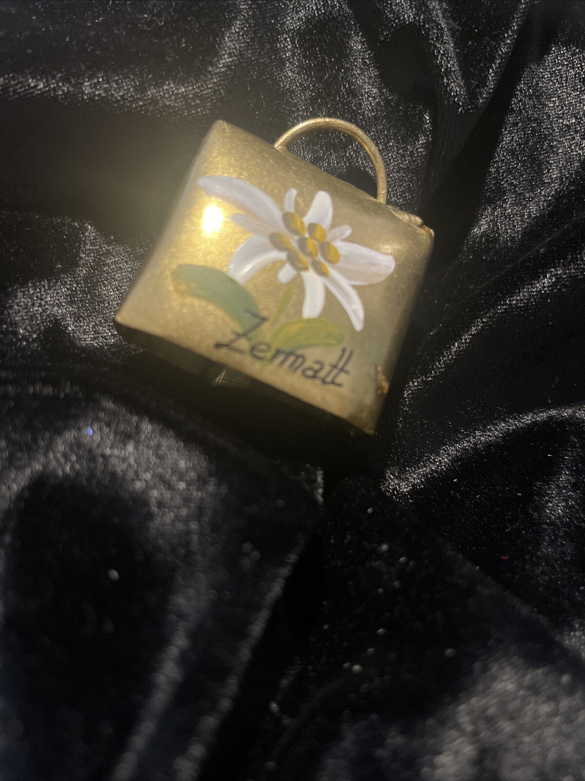 Goldtone Metal Souvenir Bell With Hand Painted White Flower