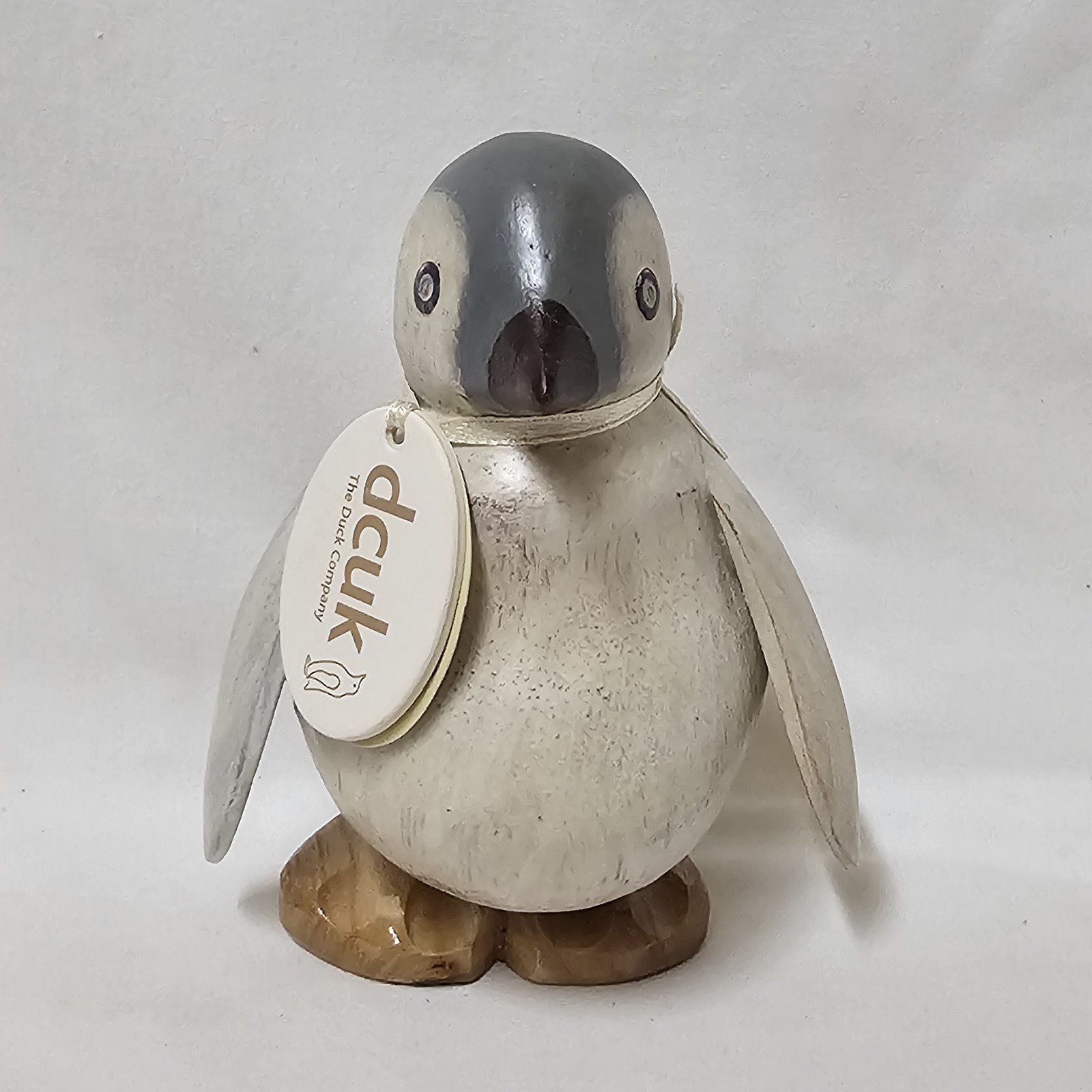 Authentic DCUK Hand-Carved Wooden Baby Emperor Penguin Figurine with Name Tag Authentic DCUK Hand-Carved Wooden Baby Emperor Penguin Figurine with Name Tag