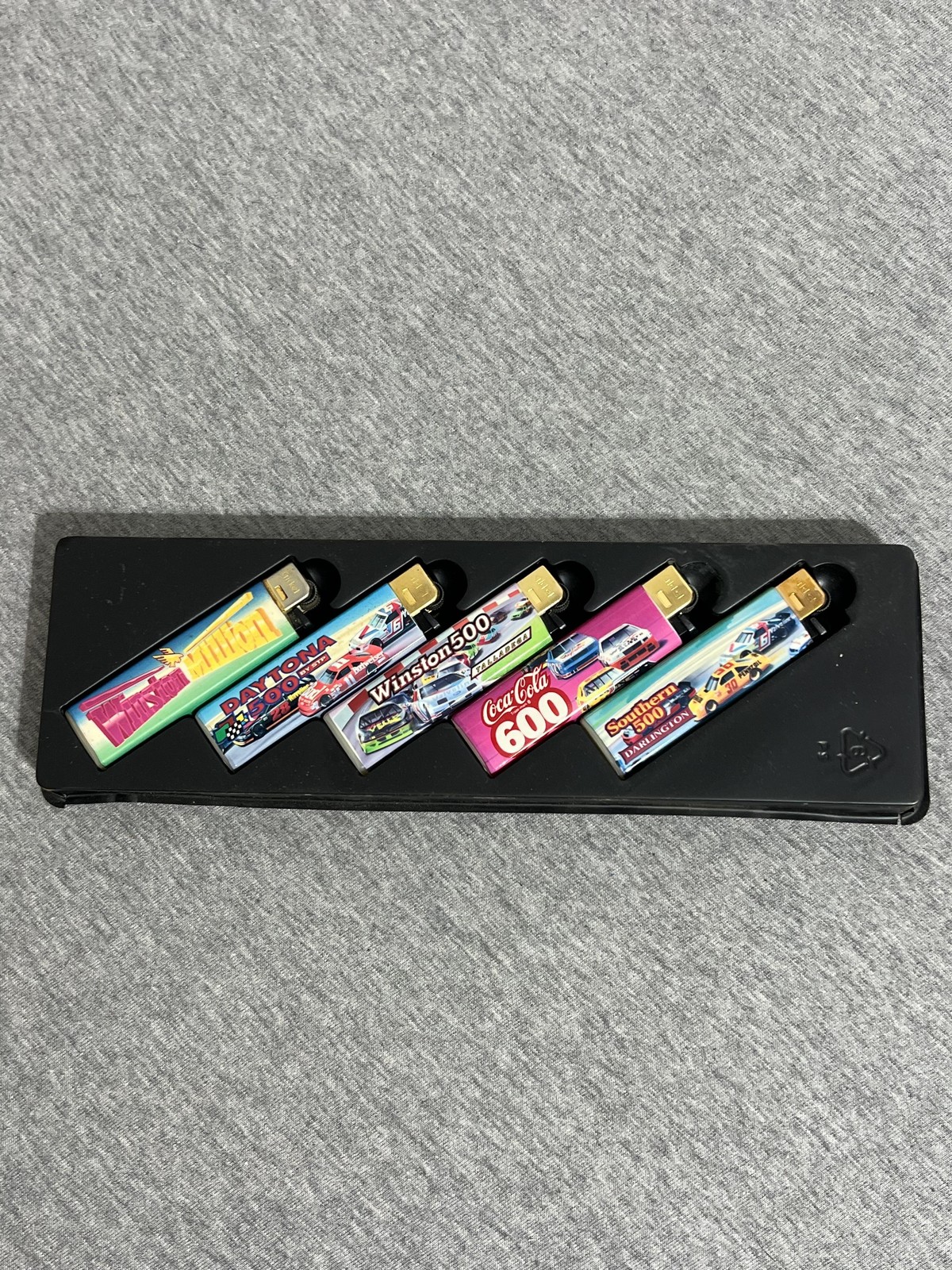 Vintage Cricket NASCAR Lighters 5pc Set Tin Daytona 500 Coca-Cola 600 Talladega