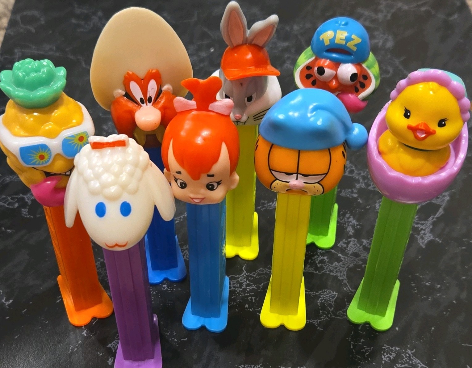 Vintage 1990s Slovenia PEZ Lot of 8 Sourz Fruit Looney Tunes Garfield Flintstone
