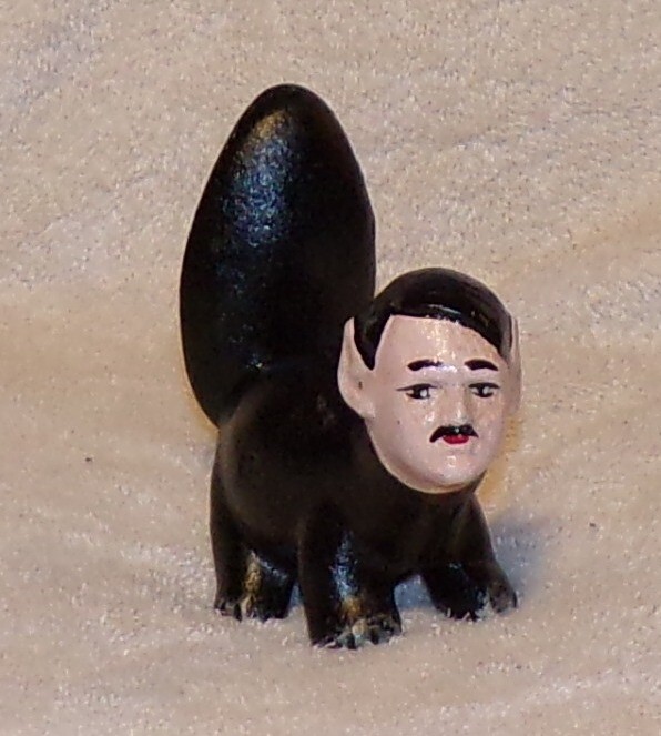 Cast Iron Anti-Hitler Skunk WWII Propaganda Cast Iron doorstop / paperweight