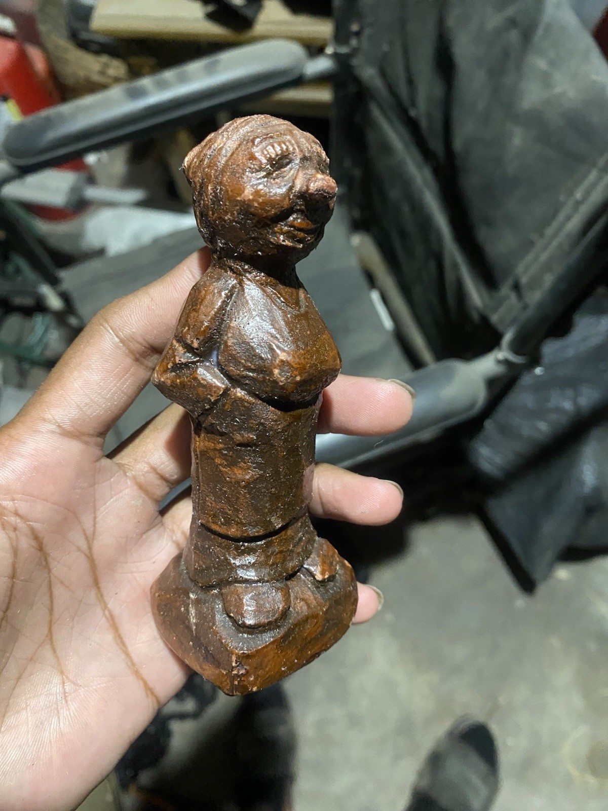 Hand-carved wooden KumanThong figurine