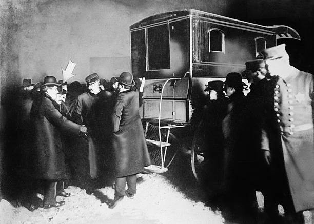 Johann Hoch is shown entering patrol wagon in New York for his ret- Old Photo