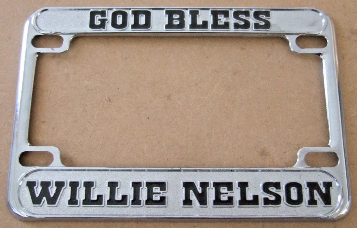 GOD BLESS WILLIE NELSON MOTORCYCLE LICENSE PLATE FRAME NICE CONDITION GOD BLESS WILLIE NELSON MOTORCYCLE LICENSE PLATE FRAME NICE CONDITION