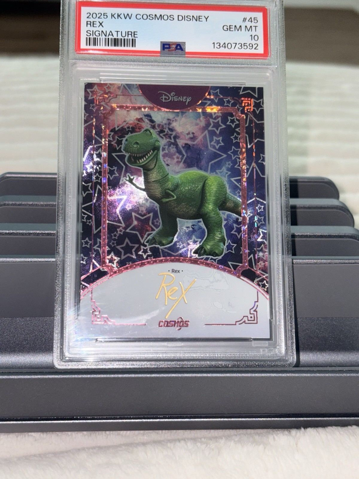 2025 Kakawow Cosmos Disney Signatures Auto #45 Rex Cosmos Star 28/100 PSA 10