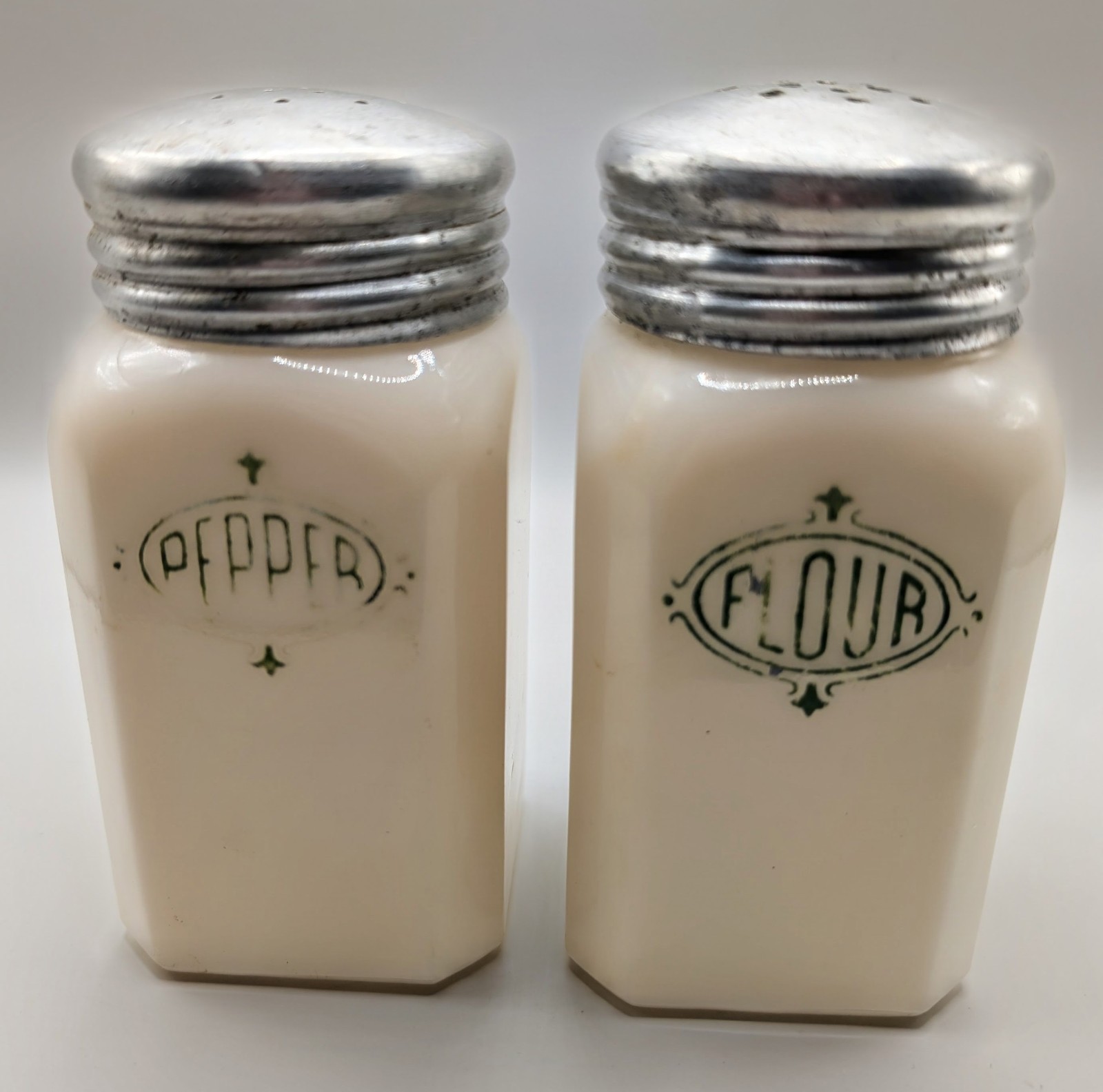 Vintage Hazel Atlas Green Shield Milk Glass Pepper Flour Shaker Set Aluminum Lid