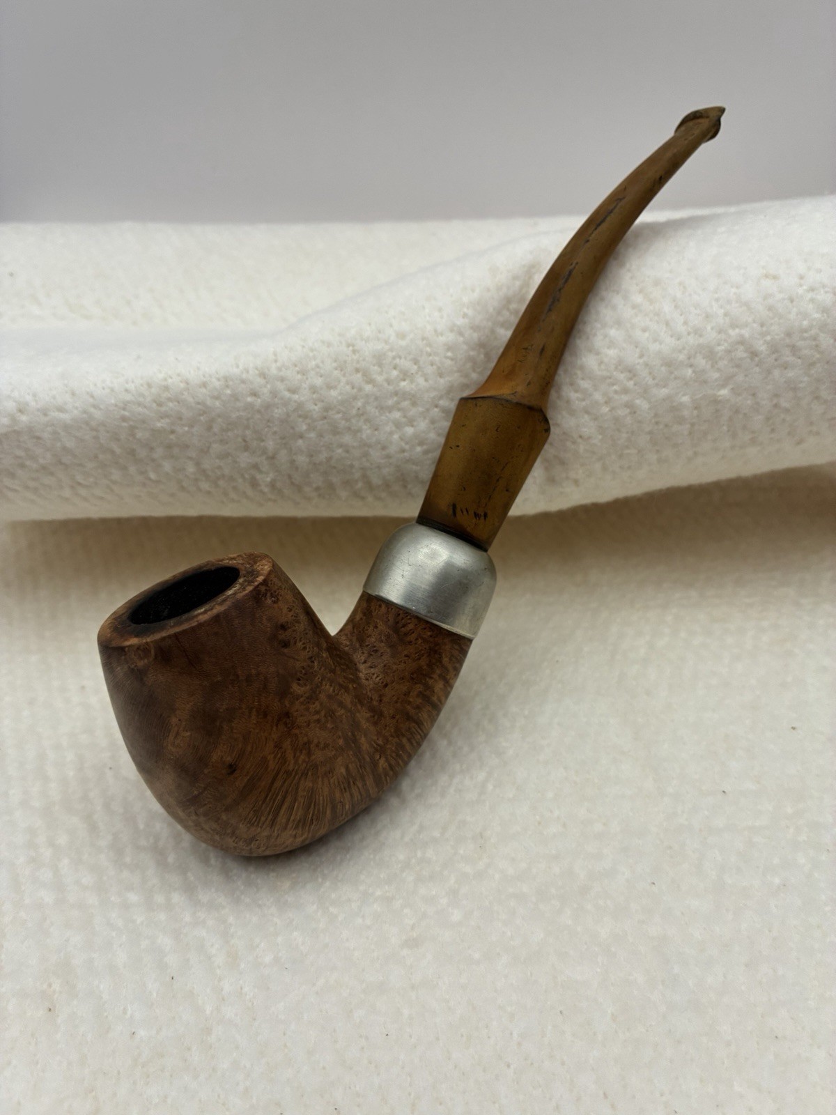 K & P Peterson's Briar Wood Pipe with Sterling Silver Band and Carved Pipe Stem K & P Peterson's Briar Wood Pipe with Sterling Silver Band and Carved Pipe Stem