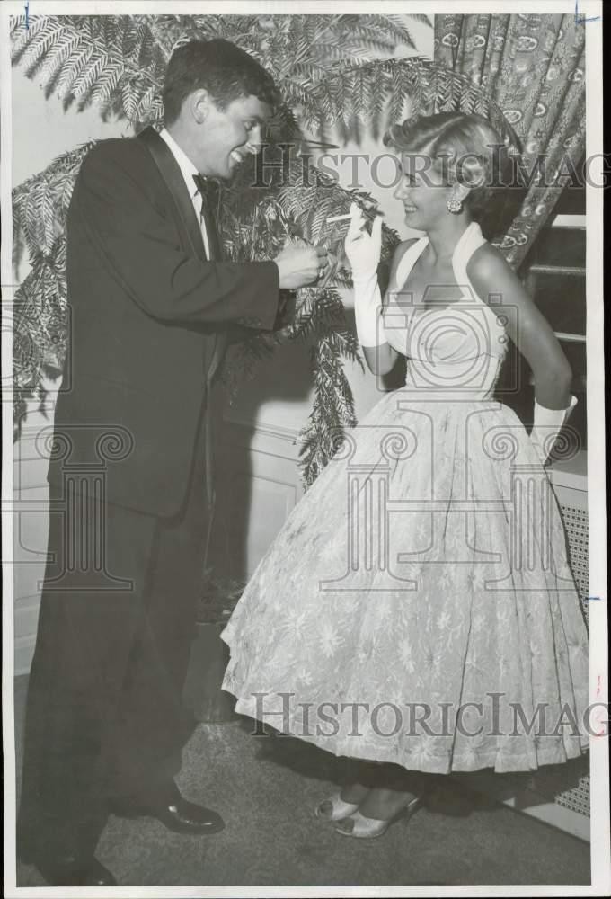 1956 Press Photo Russell Writer Jr. and wife smoke at Denver Country club ball