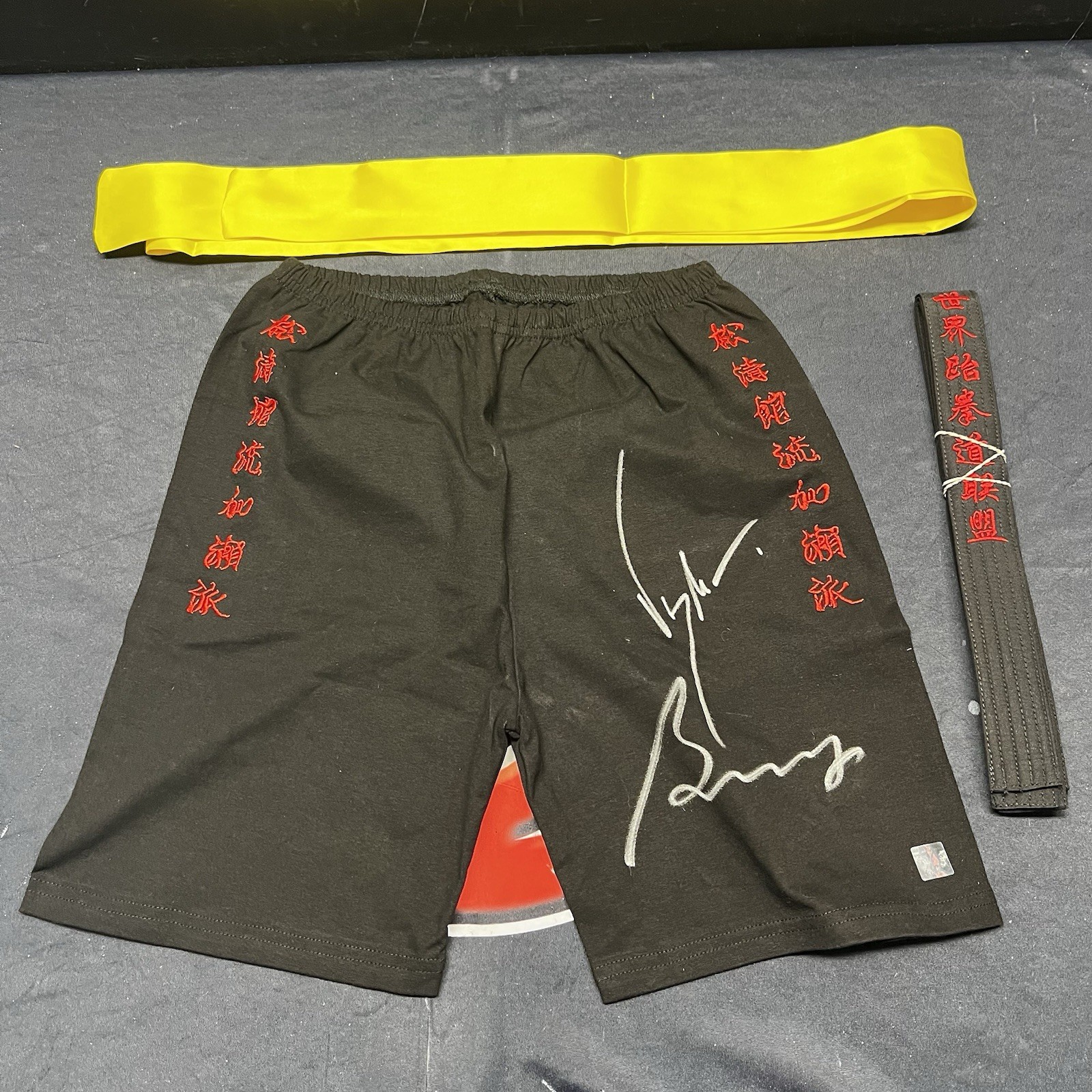 Jean Claude Van Damme & Bolo Yeung Autographed Bloodsport Trunks ASI Proof