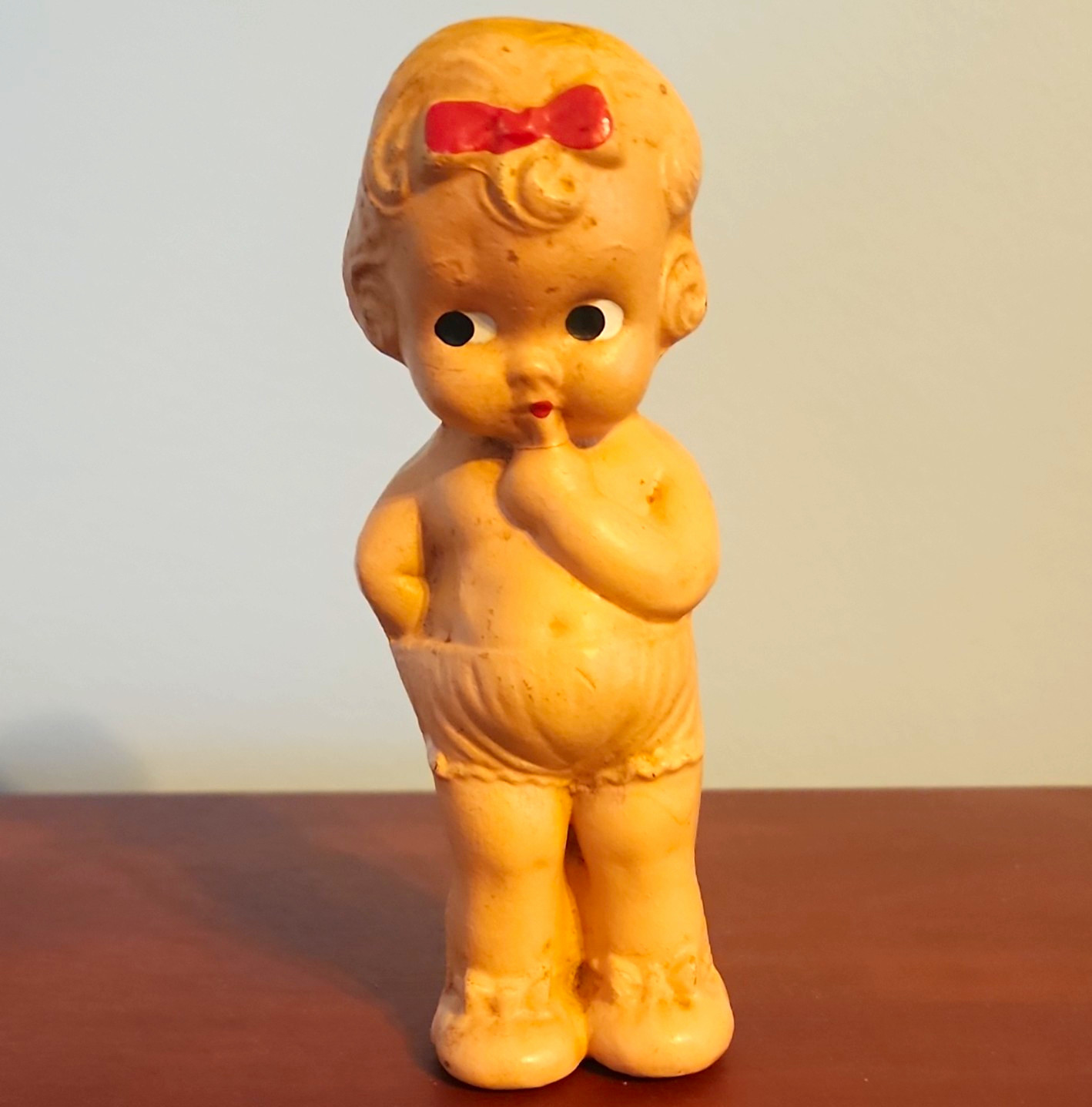 Vintage Composition Kewpie Frozen Doll With Red Bow