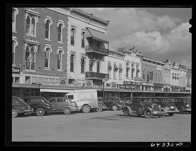 Photo:Nevada Missouri 1942 Downtown Storefronts Automobiles Main Street