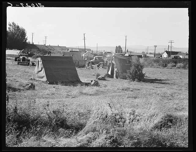 Photo:Malin Oregon 1939 Squatter Camp Entering Potato Town Tents Trucks