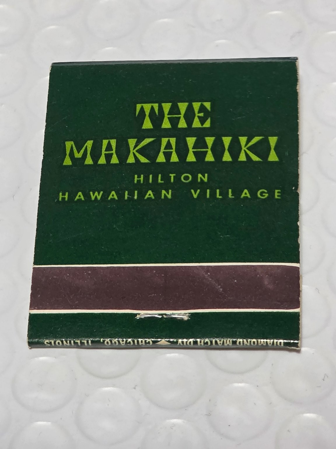 THE MAKAHIKI Hilton Hawaiian Village Vintage Mid-Century Tiki Logo Green THE MAKAHIKI Hilton Hawaiian Village Vintage Mid-Century Tiki Logo Green