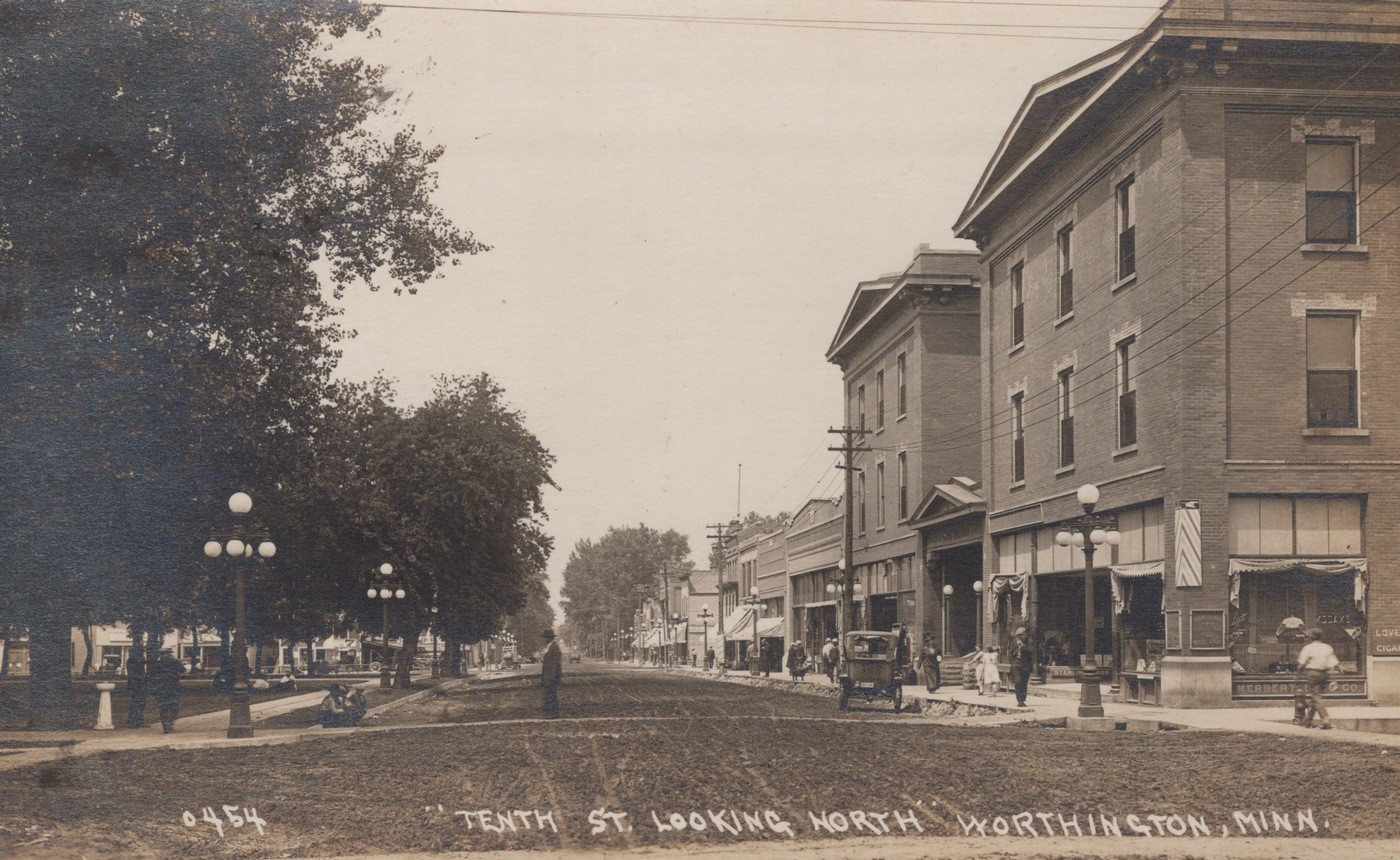 Worthington Minnesota 1913 Tenth St Commercial District - RPPC Photo Postcard