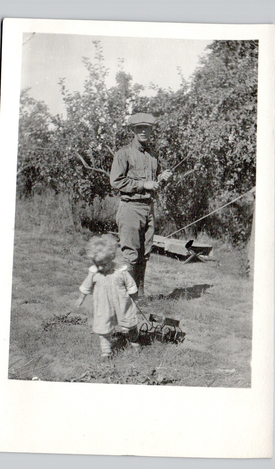 PAPA FISHES W DAUGHTER c1910 postcard portrait real photo rppc fishing girl toy