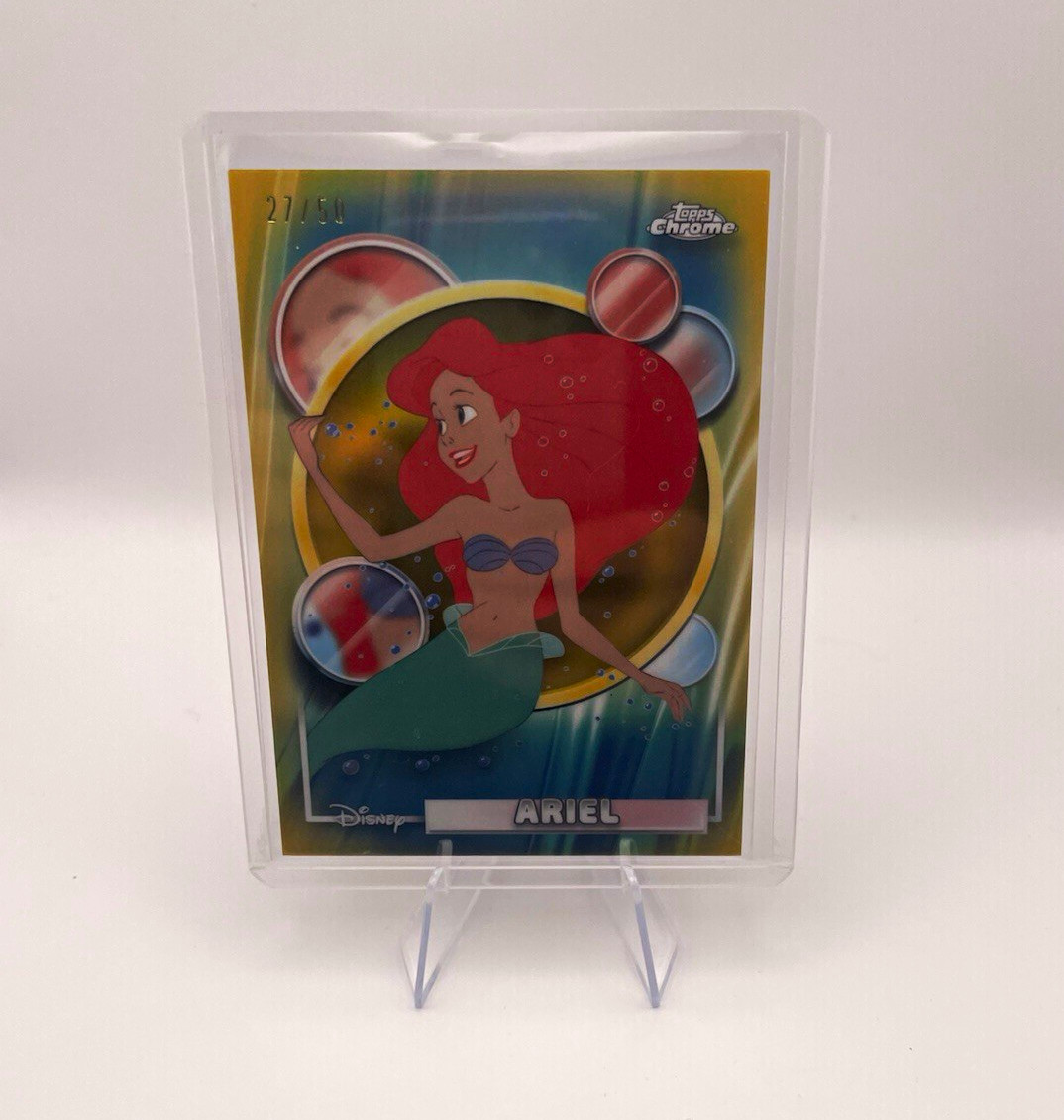 ARIEL 2026 TOPPS CHROME DISNEY GOLD REFRACTOR SERIAL NUMBERED 27/50  card #106