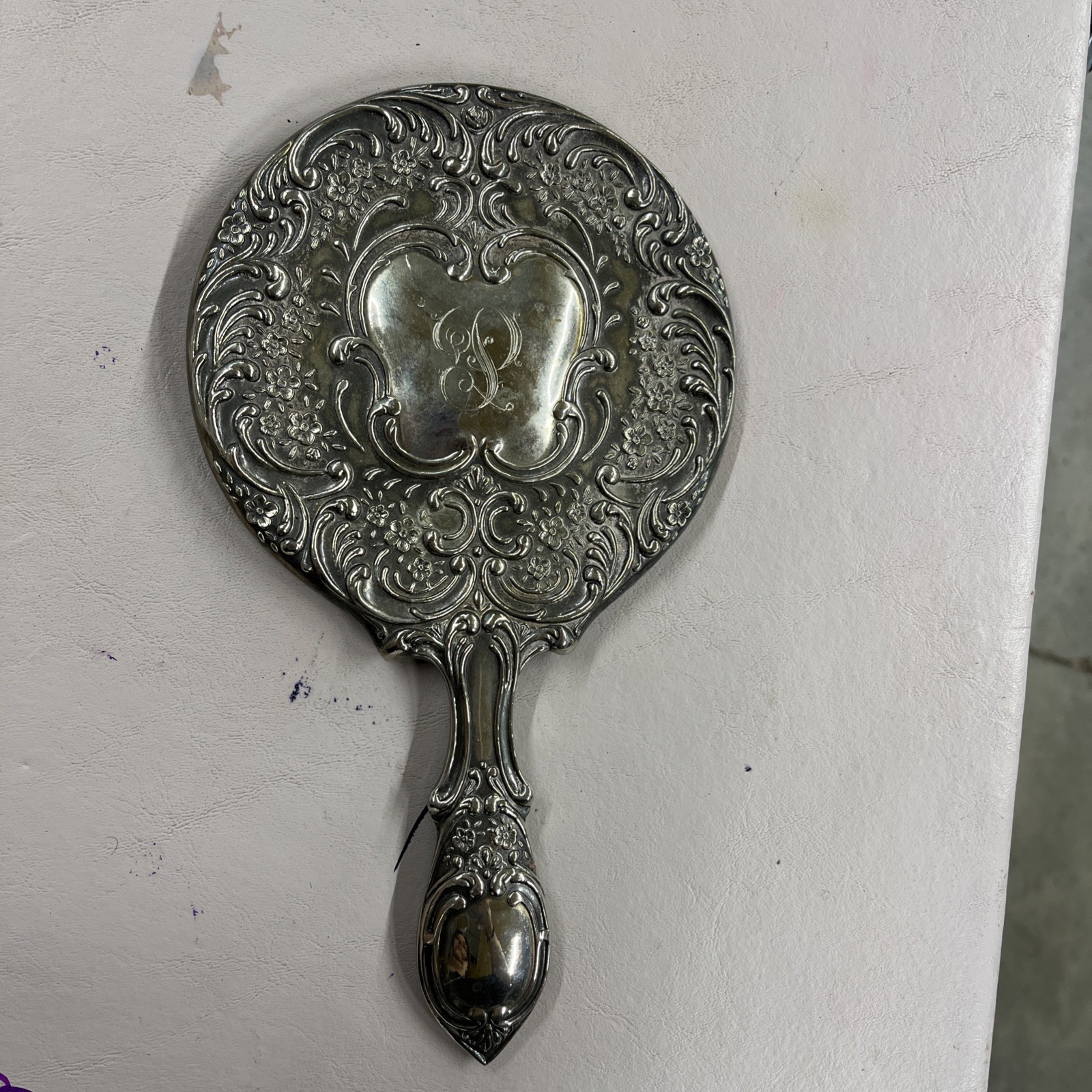 Vintage Ornate Silver Handheld Mirror with Floral Engraving