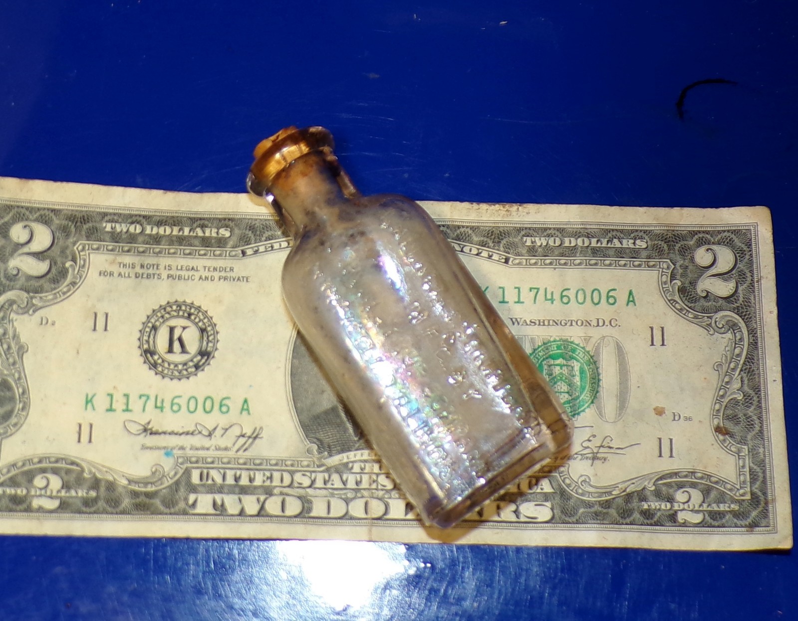 Small Antique Cork-Top Bottle Embossed \