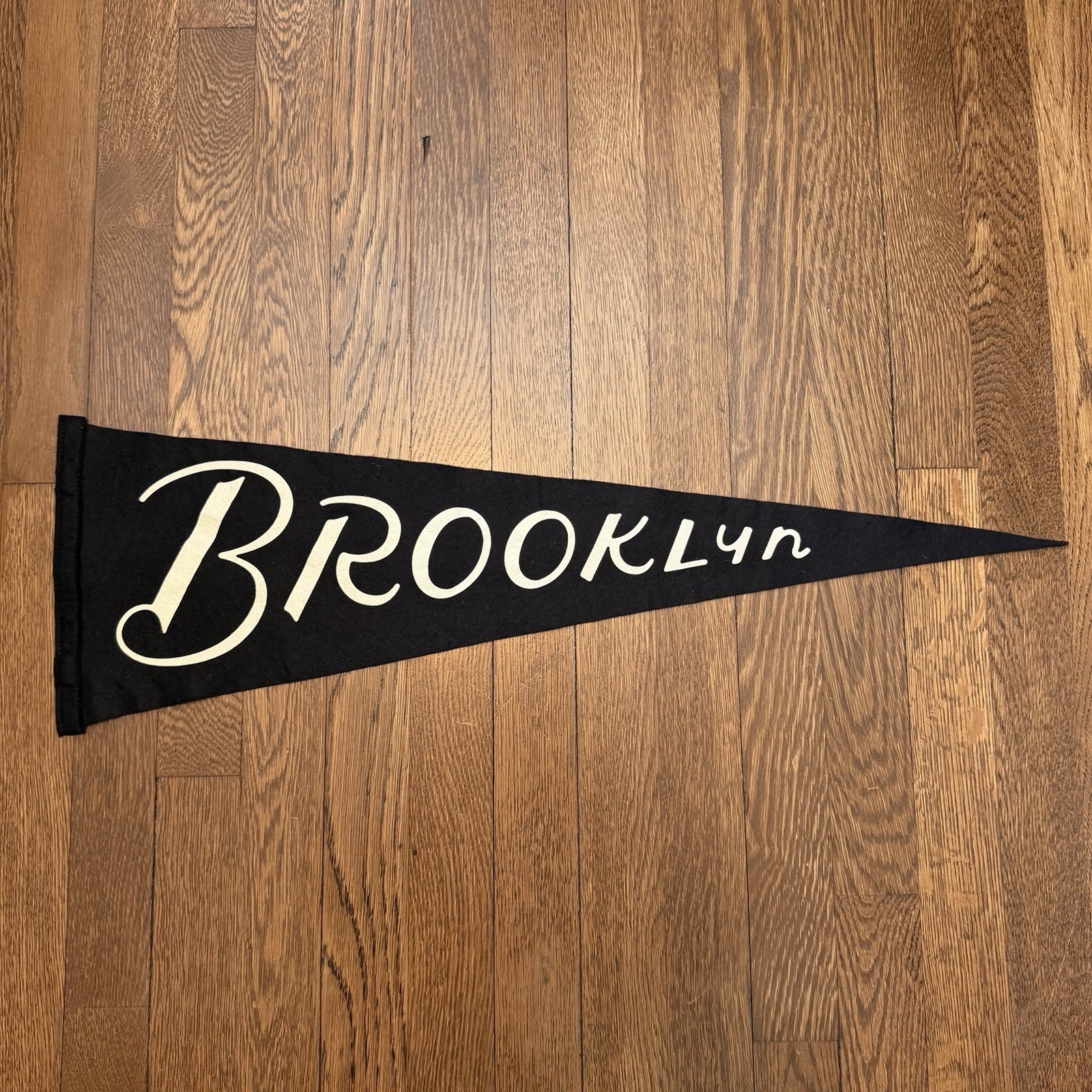 Brooklyn Pennant by Oxford Pennant in Buffalo NY | 9”x 27” in Black Felt CLEAN