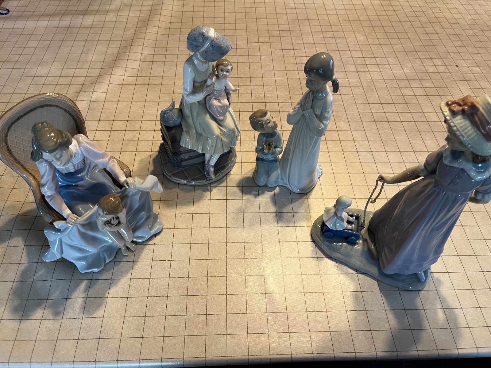 4 lladro collectable statues excellent condition