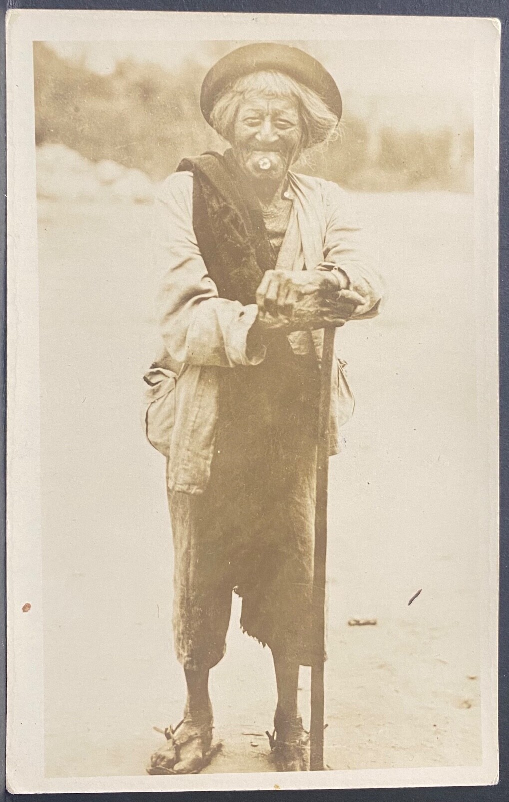 REAL PHOTO POSTCARD RPPC-INDIGENOUS MAN WITH FACE PLUG IN CHIN-SOUTH AMERICA