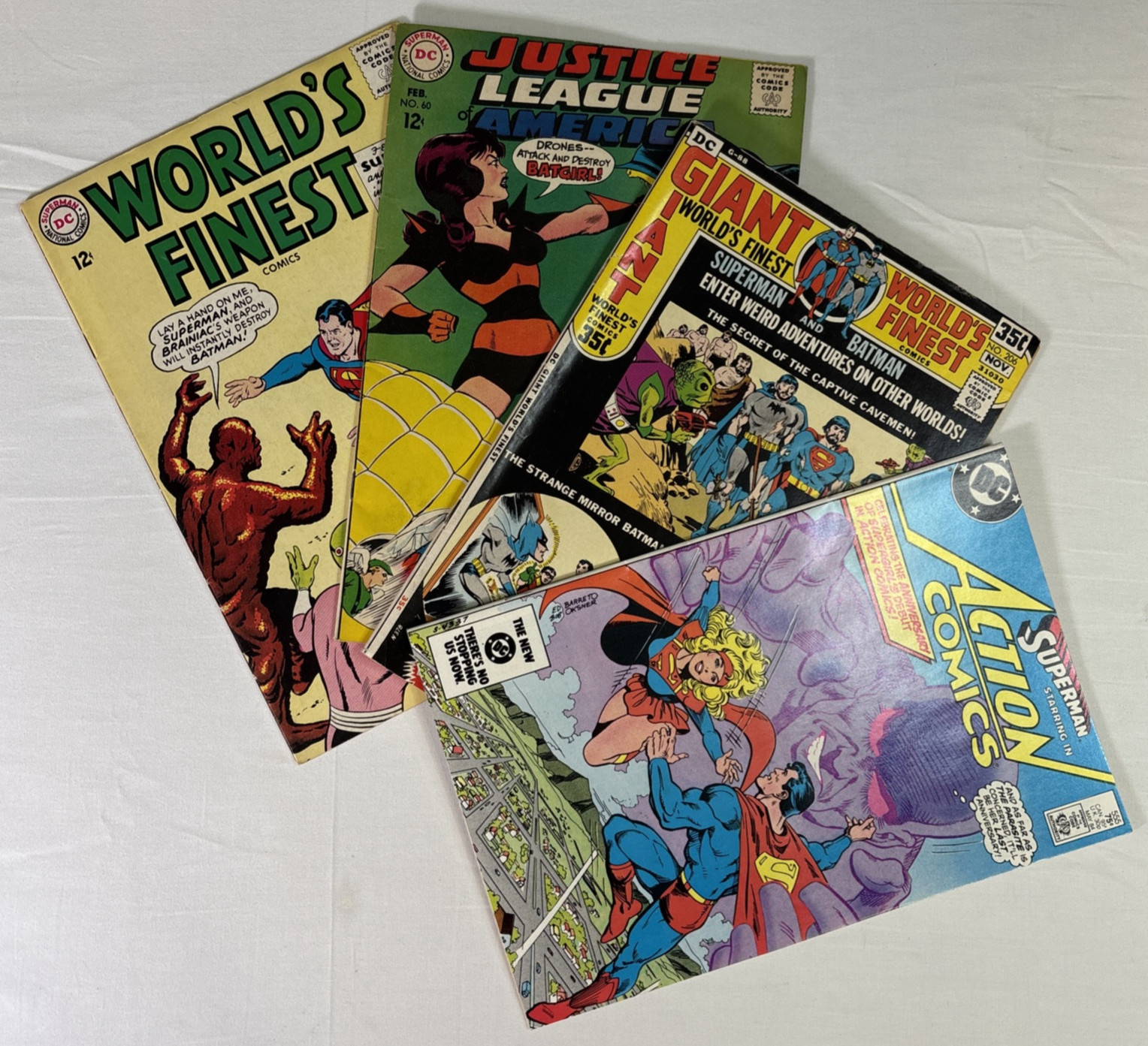 Vintage World’s Finest, Justice League, Action Mix Lot of (4) DC Comic Books.