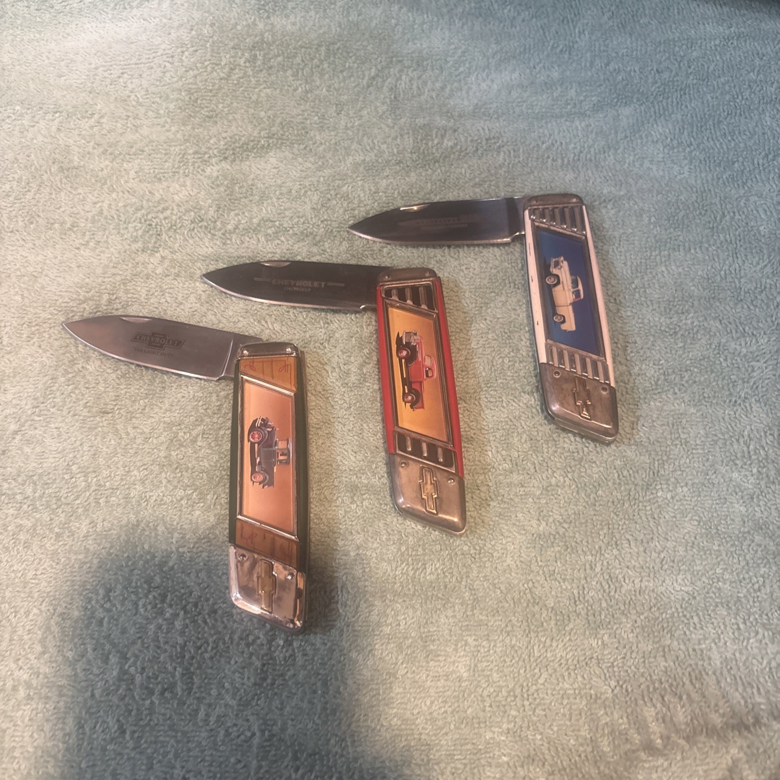3 franklin mint chevrolet very clean and rare knifes years 1928, 1941, and 1955