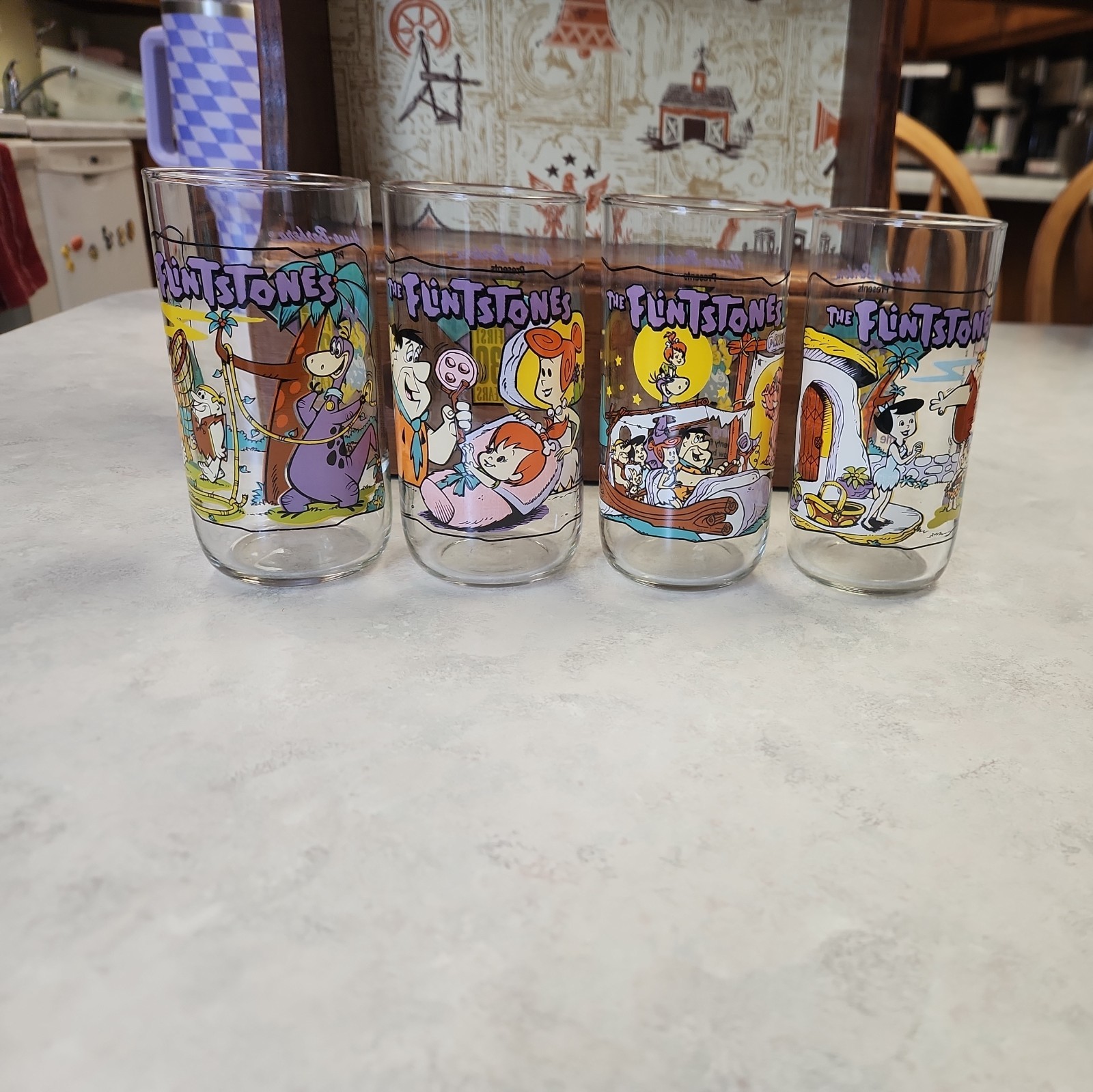 The Flintstones 1990 Hardee\'s 30th Anniversary Glasses-1960, 1963, and two 1964
