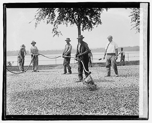 Photo:Barrett G 1920 men raking gravel waterfront road work