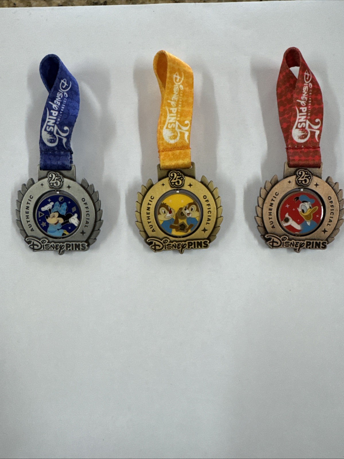 Disney Parks 2025 25 Years Of Pin Trading Medal Pins Set Of 3 - 
